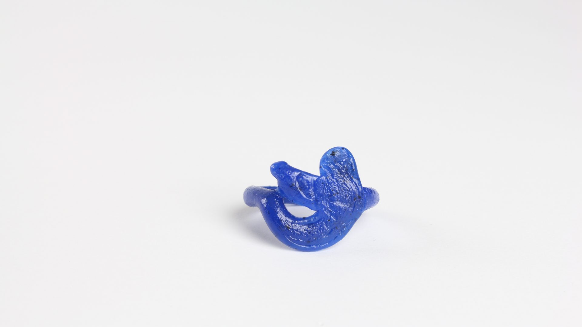 close up maro photography of a fine art unique Plastic doodle Ring out of recycled blue HDPE plastic linking to our ring collection