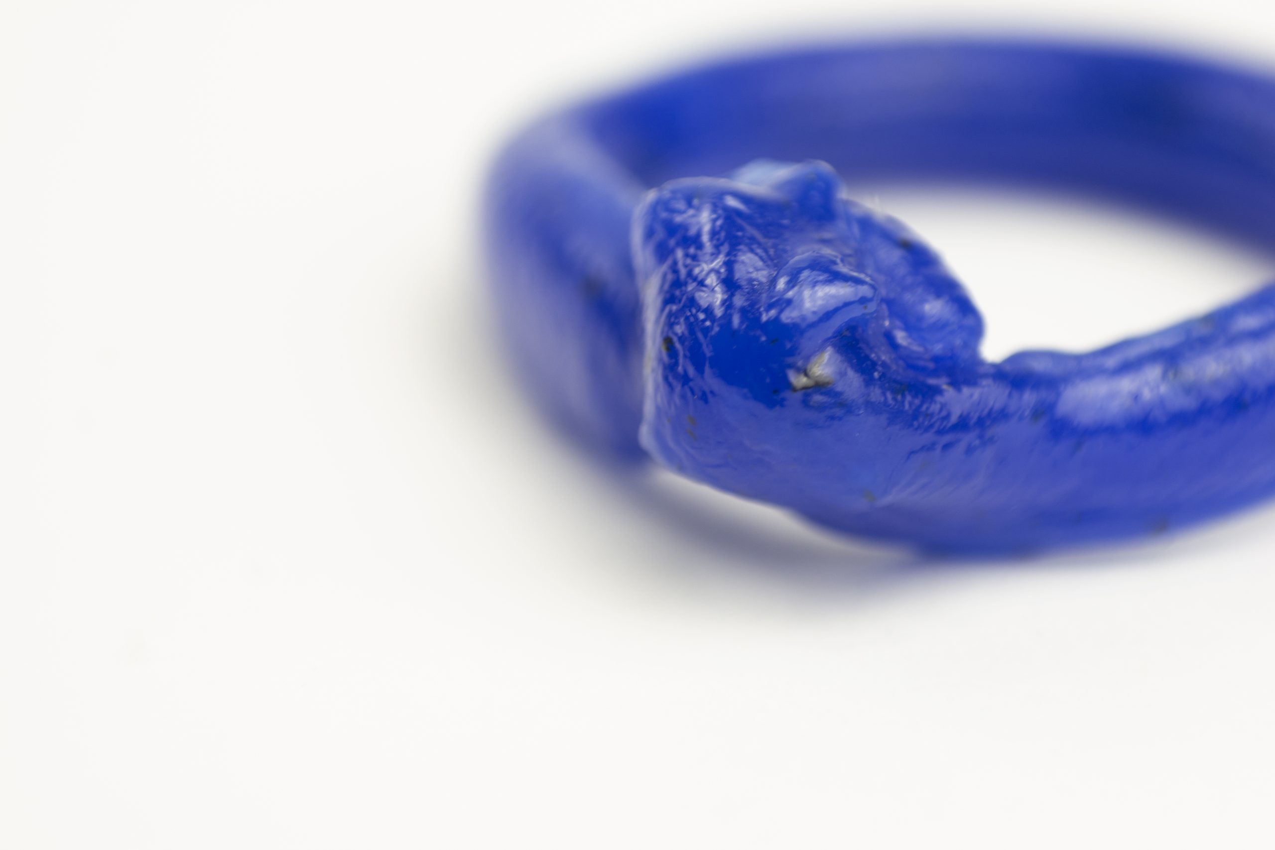 close up maro photography of a fine art unique handmade Plastic doodle Ring out of recycled blue HDPE plastic linking to our  ring collection