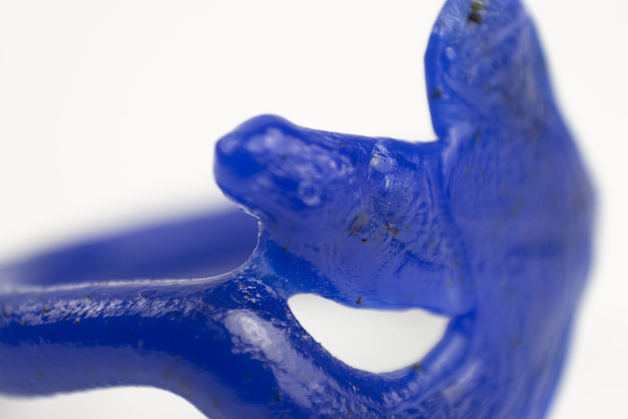 close up maro photography of a fine art unique handmade Plastic doodle Ring out of recycled blue HDPE plastic linking to our  ring collection